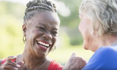 Senior women laughing together