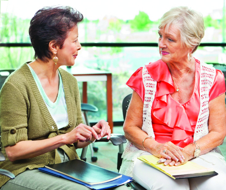 Two women meeting and planning